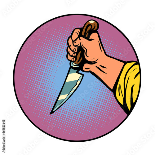a knife in a man hand. The work of a chef in a restaurant. A maniac with a cold weapon