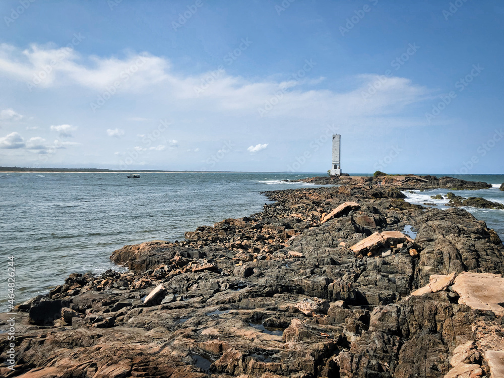 Lighthouse with rock formation in Itacare - Bahia Brazil