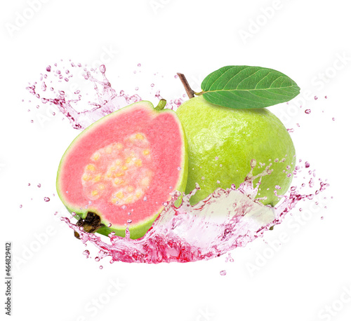 Pink guava fruit with juice splash isolated on white background.  photo