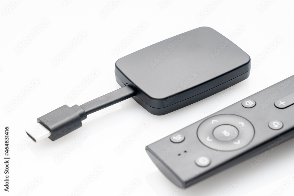 wireless internet TV set, set-top box and modern remote control, white background, selective focus, telecommunications equipment and technology concept wireless internet TV set, set-top box and modern remote control, white background, selective focus, telecommunications equipment and technology concept