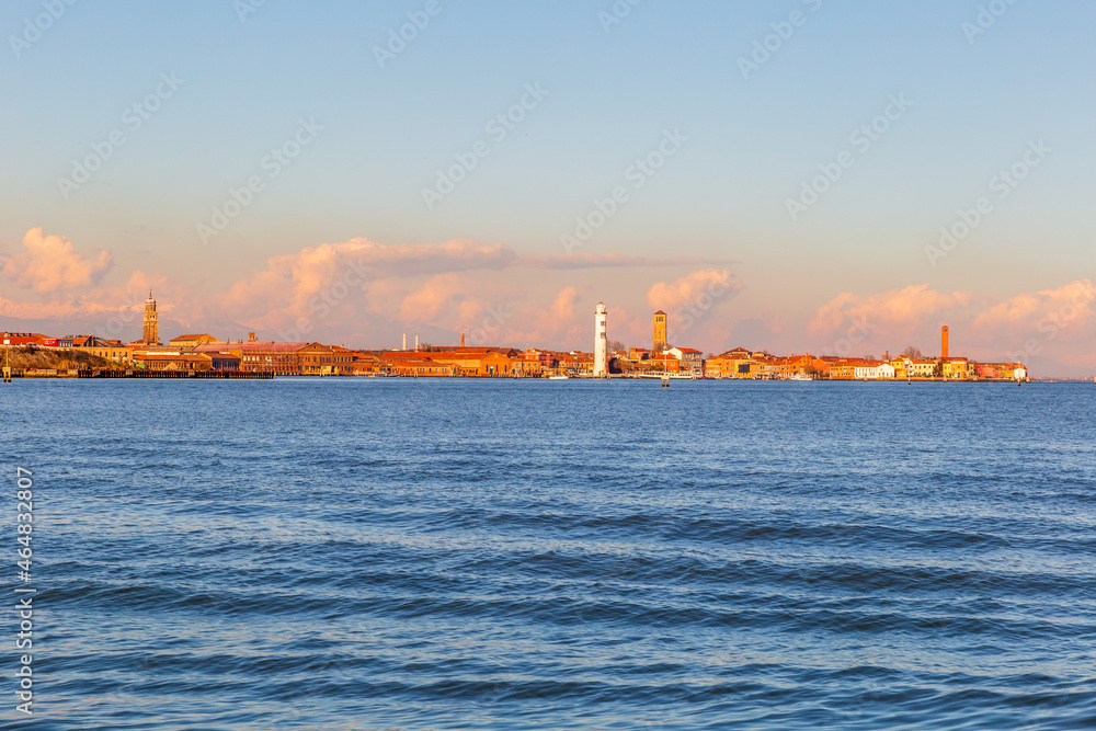 Venetian lagoon at dawn, in the background the island of Murano, Italy