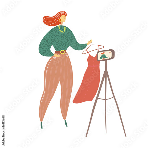 Woman shooting a video on a camera. Stylist makes recommendations to his clients online. Fashion blog concept. Vector illustration in hand drawn style