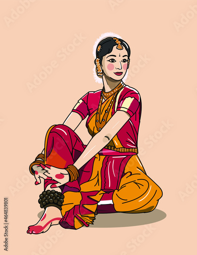 Indian woman is sitting in a Bharatnatyam dance pose wearing traditional clothes and ornaments. photo