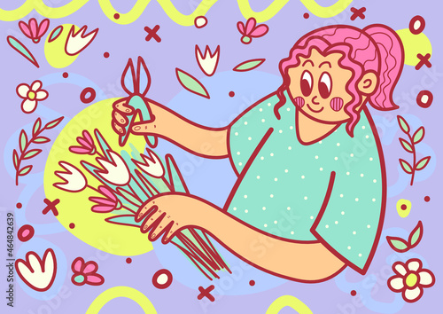 The florist composes a flower arrangement
