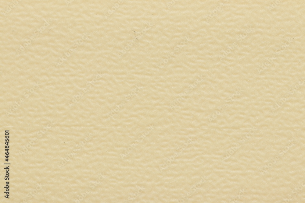 Beige PVC plastic texture for edging chipboard ends. Decorative beige background texture. Beige PVC plastic texture for edging chipboard ends. Decorative beige background texture.