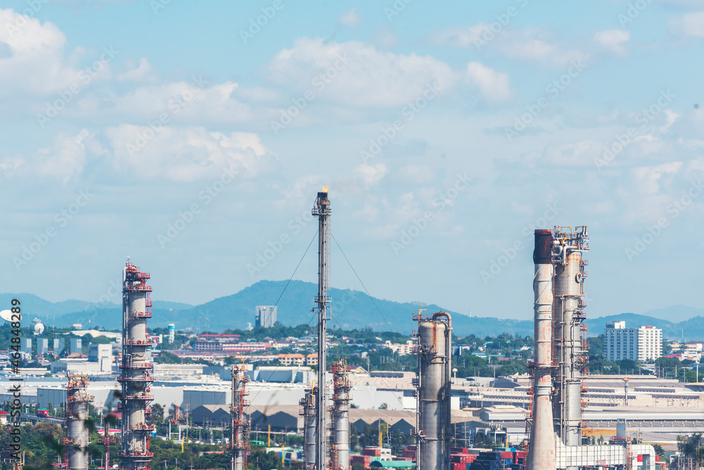 Fototapeta premium Oil refinery gas petrol plant industry with crude tank, gasoline supply and chemical factory. Petroleum barrel fuel heavy industry oil refinery manufacturing factory plant. Refinery industry concept