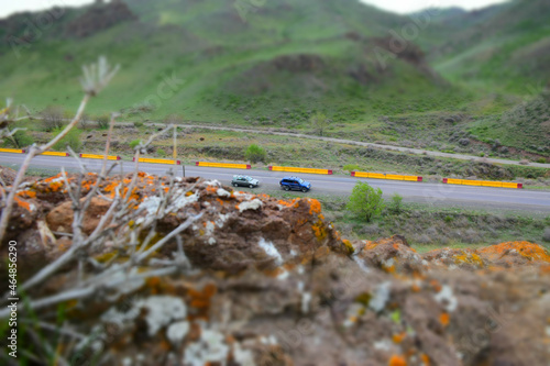 Slika na platnu Look at car's miniature from rock during the travel