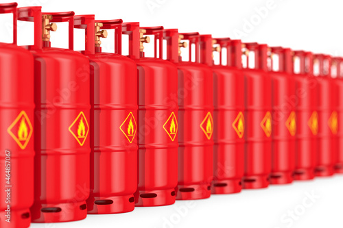 row gas cylinders on white ...