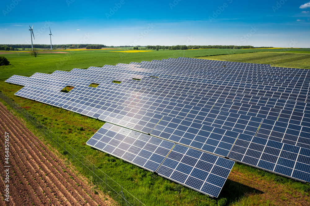Big and blue solar panels as a renewable energy source. Big and blue solar panels as a renewable energy source.