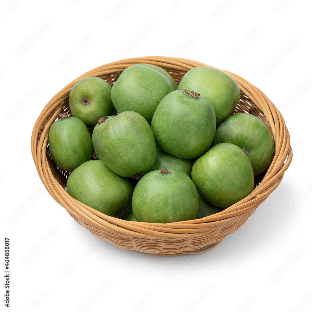 Basket with fresh whole kiwi berries close up isolated on white background Basket with fresh whole kiwi berries close up isolated on white background