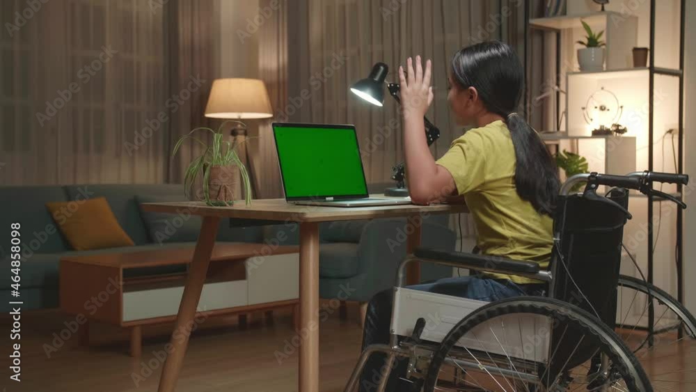 Asian Kid Girl Sitting In A Wheelchair And Raise Hand Before Asking A Question While Learning Online On Laptop Computer With Mock Up Green Screen At Home
Asian Kid Girl Sitting In A Wheelchair And Raise Hand Before Asking A Question While Learning Online On Laptop Computer With Mock Up Green Screen At Home