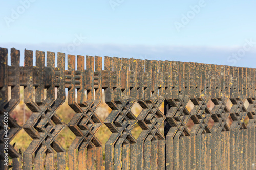 An old metal fence that encloses the territory of the Jewish cemetery in Galicia