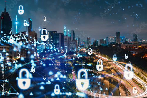 Photography Glowing padlock hologram, night panoramic city view of Kuala Lumpur, Malaysia, Asia
