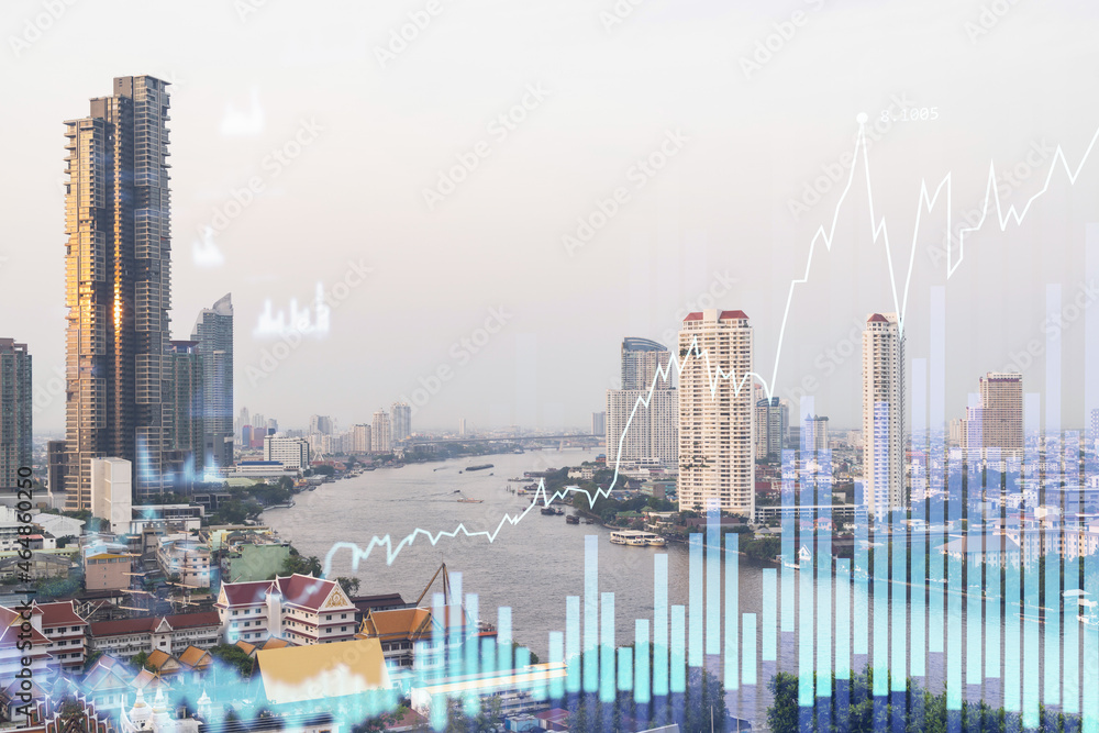 Forex and stock market chart hologram over panorama city view of Bangkok, the financial center in Southeast Asia. The concept of international trading. Double exposure. Forex and stock market chart hologram over panorama city view of Bangkok, the financial center in Southeast Asia. The concept of international trading. Double exposure.
