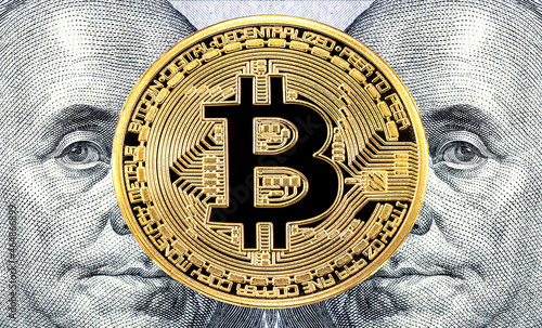 Golden coin bitcoin and Benjamin Franklin portrait from one hundred american dollars