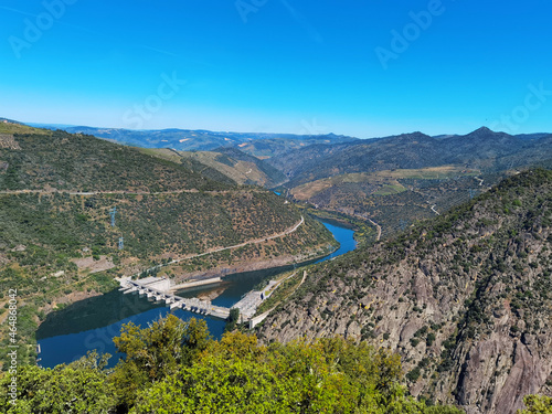 Between hills and mountains, the Douro river and the Valeira dam in the background for electricity production photo