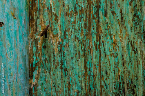 old board painted with blue paint. background