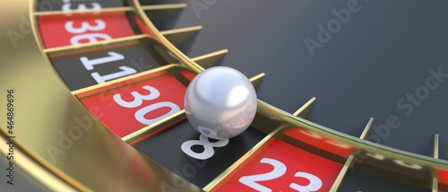 Photos Casino roulette, ball stopped on black 8  number closeup