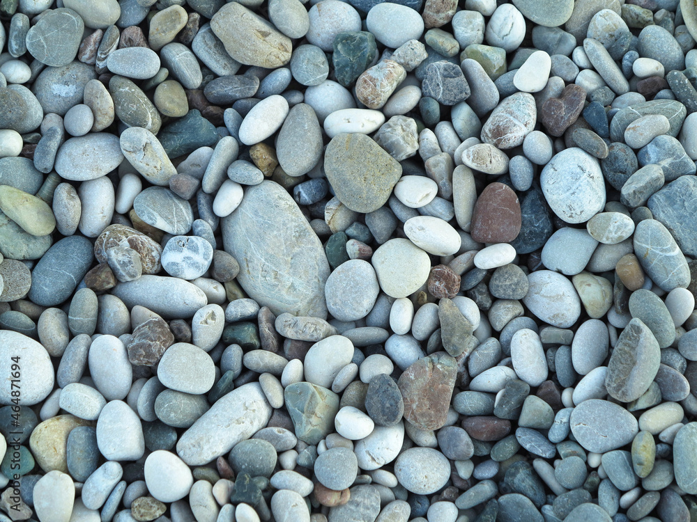 Sea colorful and gray small stones pebbles on a beach Sea colorful and gray small stones pebbles on a beach