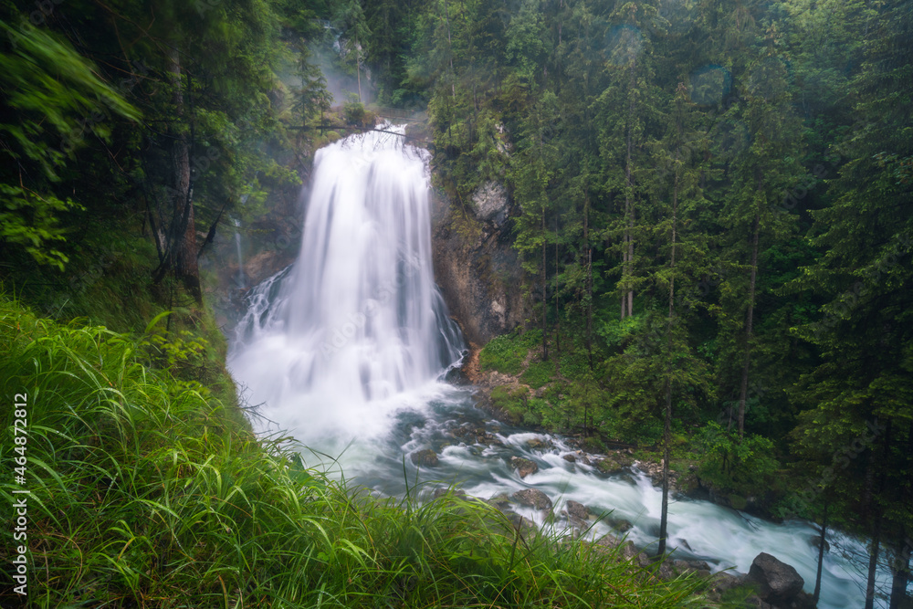 Fototapeta premium The Gollinger waterfall in Austria on rainy day
