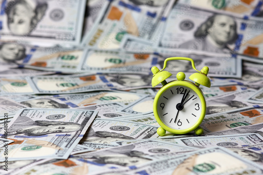 alarm clock and dollars time money alarm clock and dollars time money