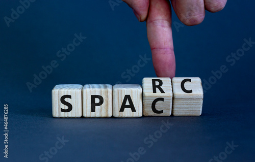 SPARC, special purpose acquisition rights company symbol. Cubes with words 'SPARC, SPAC' on beautiful grey background, copy space. Business, SPARC, special purpose acquisition rights company concept. photo