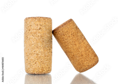 Two wine corks, close-up, isolated on white.