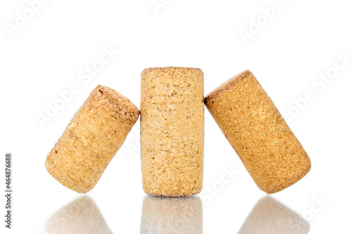 Three wine corks, close-up, isolated on white.