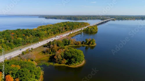 Transcanada highway, Lake of Two Mountains Bridge and fall season colors in the outskirts of Montreal. photo