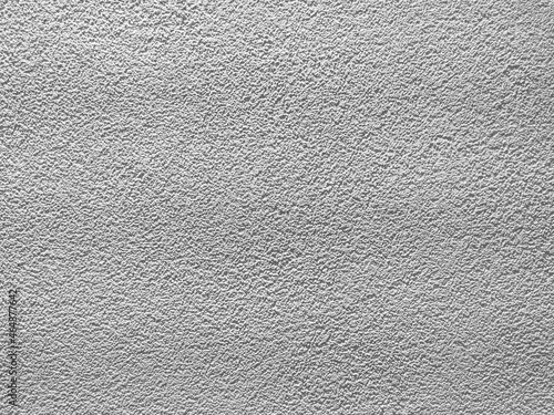 Close-up concrete wall texture. Uniform white wall. Rough wall.