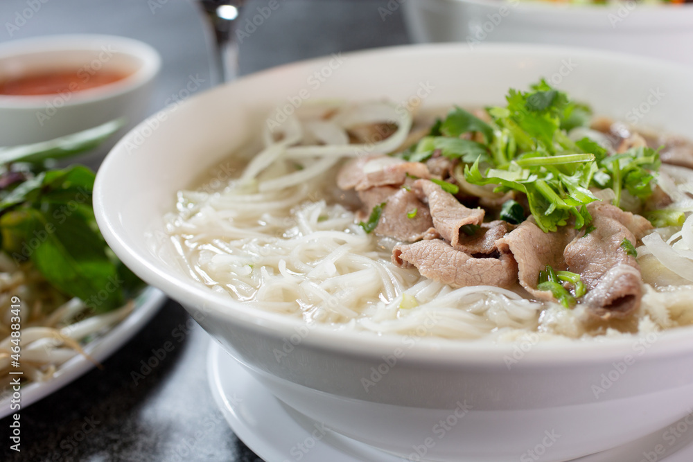 A view of a bowl of beef Pho. A view of a bowl of beef Pho.