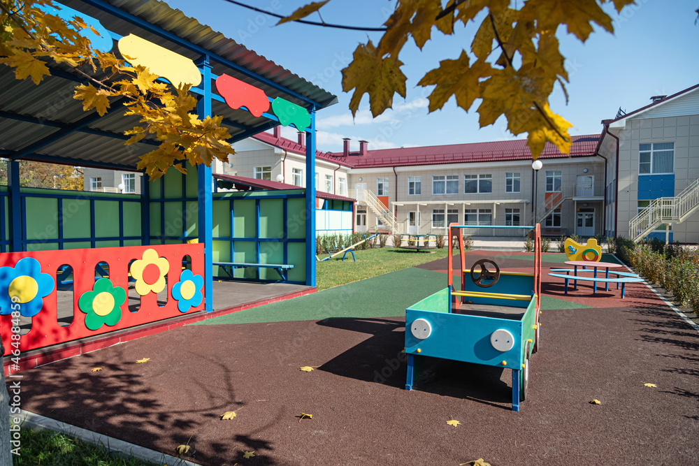 Children's playground of the new kindergarten at autumn Children's playground of the new kindergarten at autumn