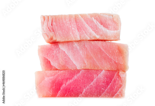 Fresh raw pink appetizing tuna steaks close-up. Isolated over white background. Tuna sashimi