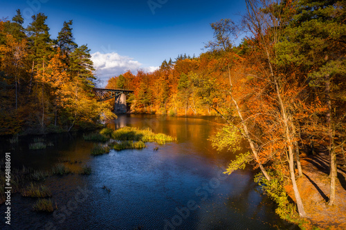 Fototapeta Naklejka Na Ścianę i Meble -  Autumnal scenery and the railway bridge in Rutki, Kashubia. Poland