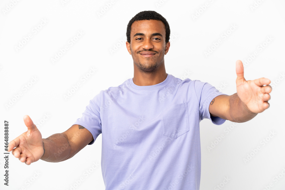 African American handsome man on isolated white background presenting and inviting to come with hand African American handsome man on isolated white background presenting and inviting to come with hand