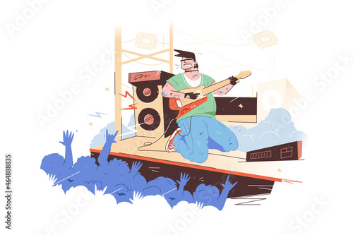 Rock guitarist plays at concert