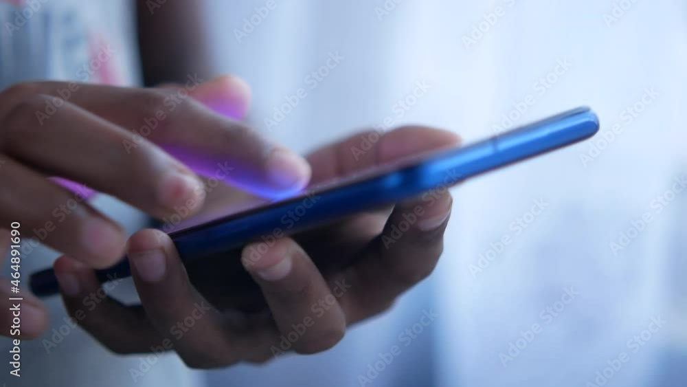 child hand pointing finger on smart phone screen. child hand pointing finger on smart phone screen.