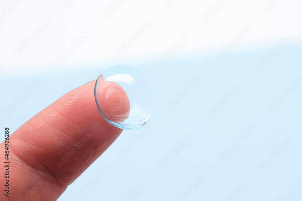 contact lenses on blue backgroundn close up view - Image contact lenses on blue backgroundn close up view - Image