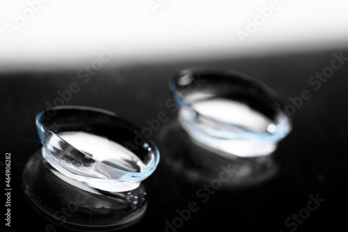 contact lenses on dark background close up view - Image