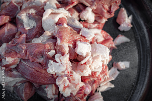 Raw red meat. Meat dish. A hearty dinner. Protein in the diet. Roast ingredients. Men's food. Fresh veal and beef. Veined juicy meat. Appetizing background. Healthy appetite.