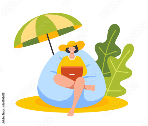 Young Businesswoman Sitting in Beanbag Chair on Tropical Beach. Woman Freelancer Work on Laptop under Umbrella