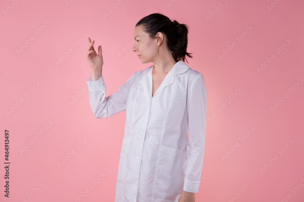 A doctor, a laboratory assistant or a researcher in a white coat A doctor, a laboratory assistant or a researcher in a white coat