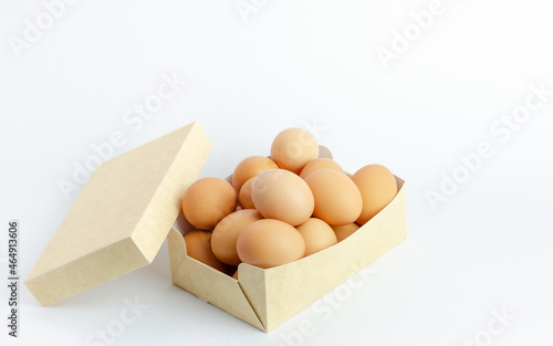 Box of frsh eggs isolated on a white background photo