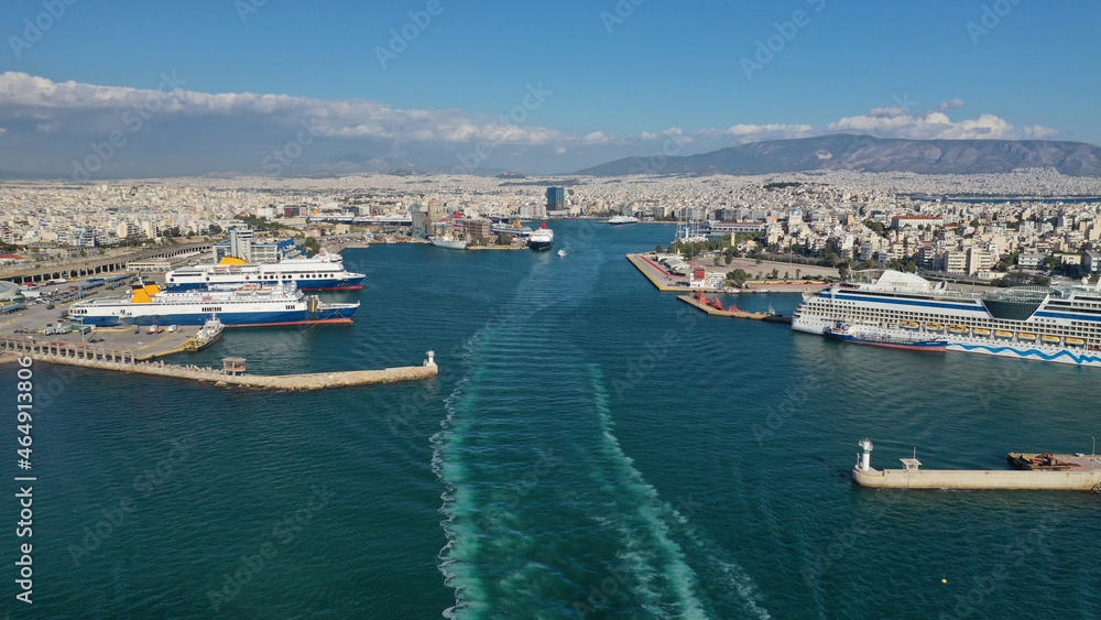 Aerial drone photo of famous and busy port of Piraeus where passenger ferries travel to Aegean destination islands as seen from high altitude, Attica, Greece