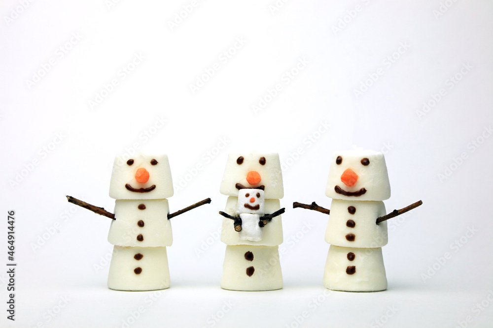 A Happy Smiling Marshmallow Snowman Baby Chilling With Family A Happy Smiling Marshmallow Snowman Baby Chilling With Family
