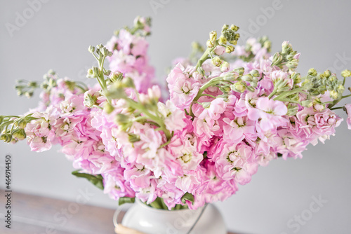 Wallpaper Mural Bouquet of Beautiful lilac mattiola. Spring flowers in vase on wooden table. Flowers delivery. Torontodigital.ca