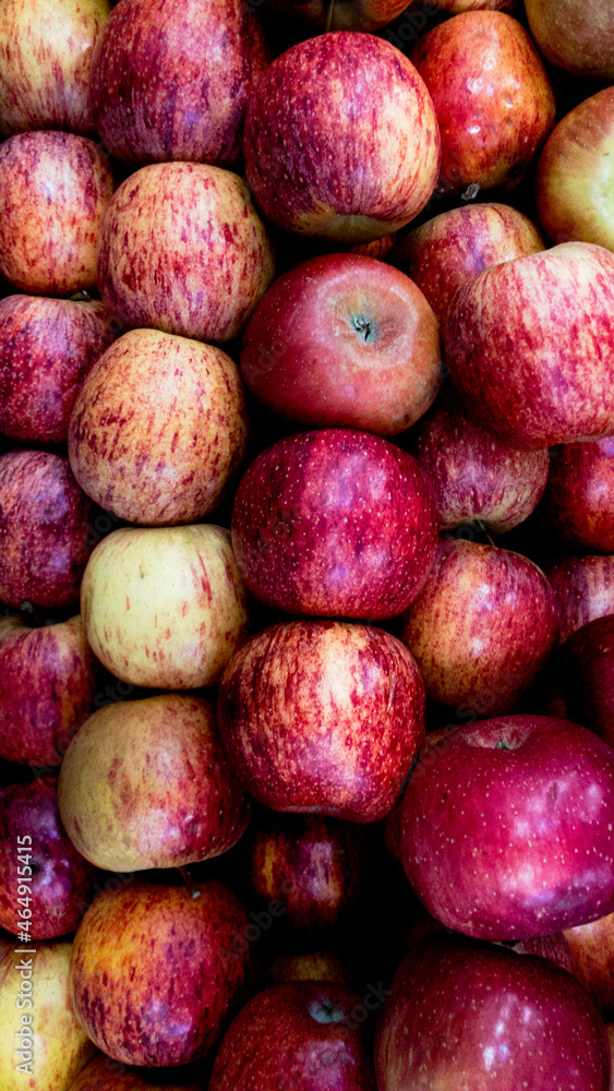 Fruits and vegetables background. Healthy Living: Elevate Your Well-being with Nutritious Habits! Close-up of apples in a supermarket. Fruits and vegetables background. Healthy Living: Elevate Your Well-being with Nutritious Habits! Close-up of apples in a supermarket.