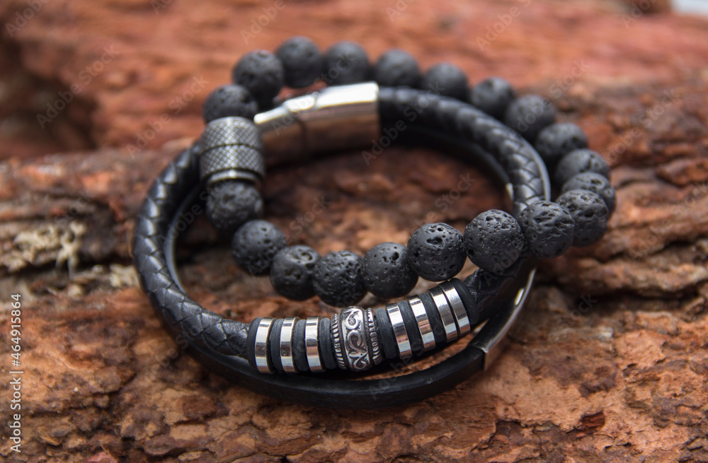 Obraz premium Men's Leather Bracelet close-up. Volcanic Stone Bracelet