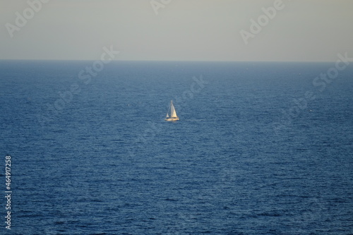 A white sailing boat in front of Monaco. the 23rd October 2021. © Yann Vernerie