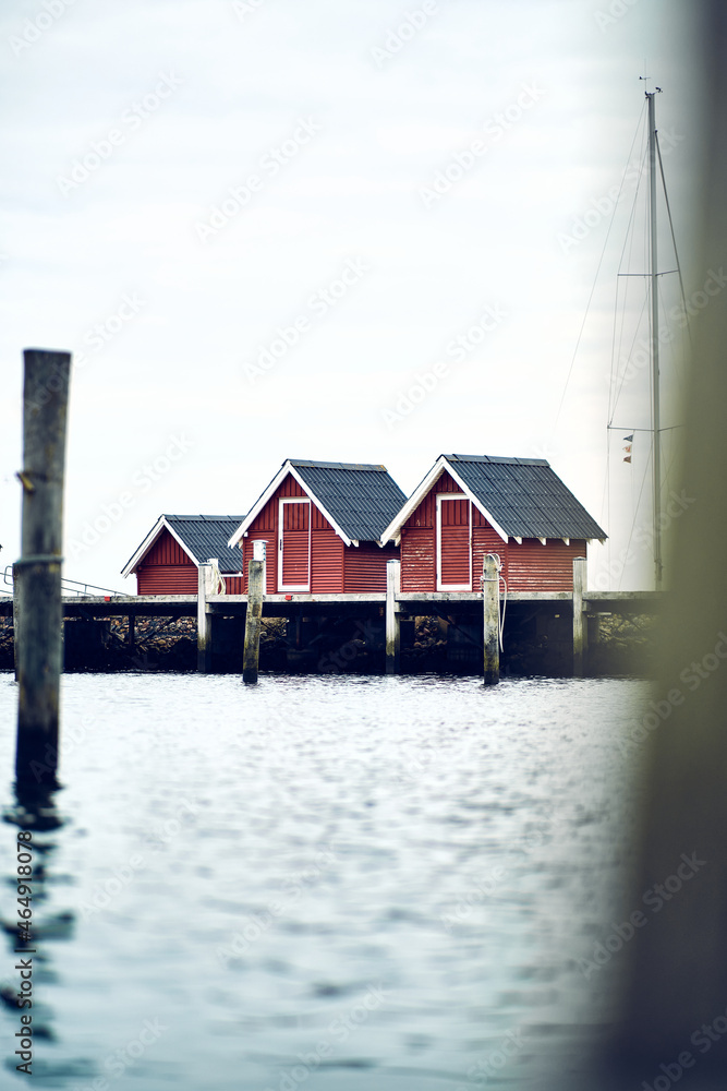 Tiny red houses at the Harbour of Struer, Denmark. Tiny red houses at the Harbour of Struer, Denmark.